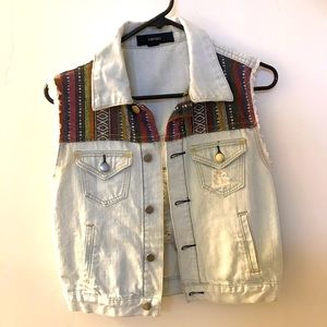 Distressed denim vest